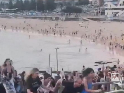 “悉尼邦迪滩枪击悲剧：12人性命陨落，社会震惊反思安全议题”